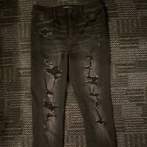 AE size 10 black distressed jeans, lightly worn.